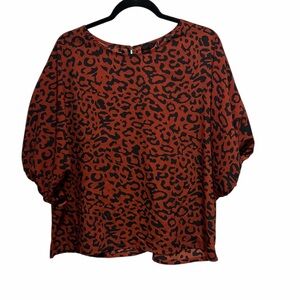 Chic Animal Print Blouse in Red and Black